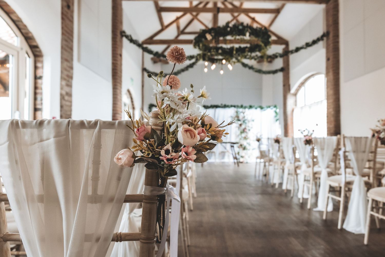 Documentary wedding photography of Dunstall Barn ceremony setup.