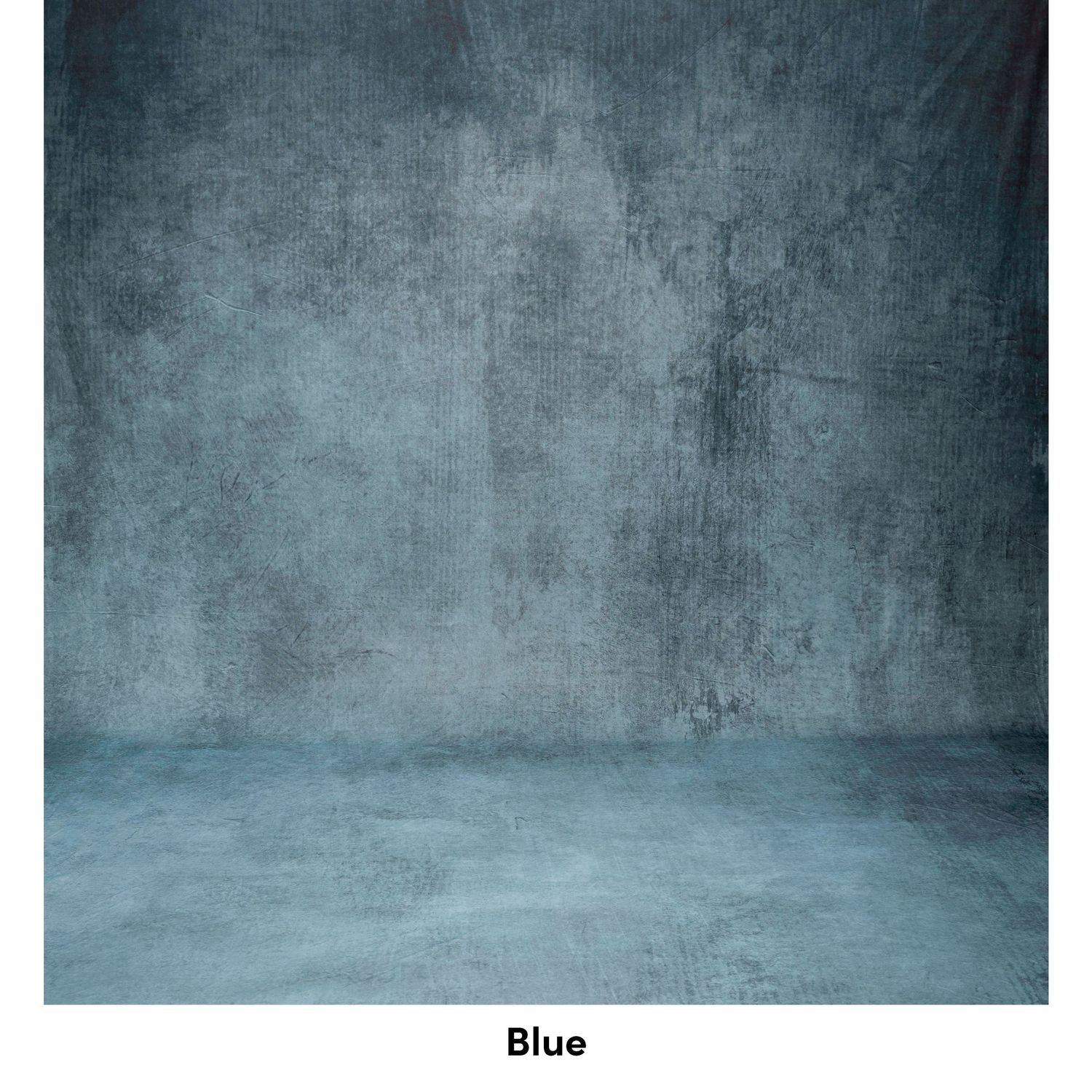 Dark blue textured concrete wall and floor background with moody gradient lighting and atmospheric gray tones.