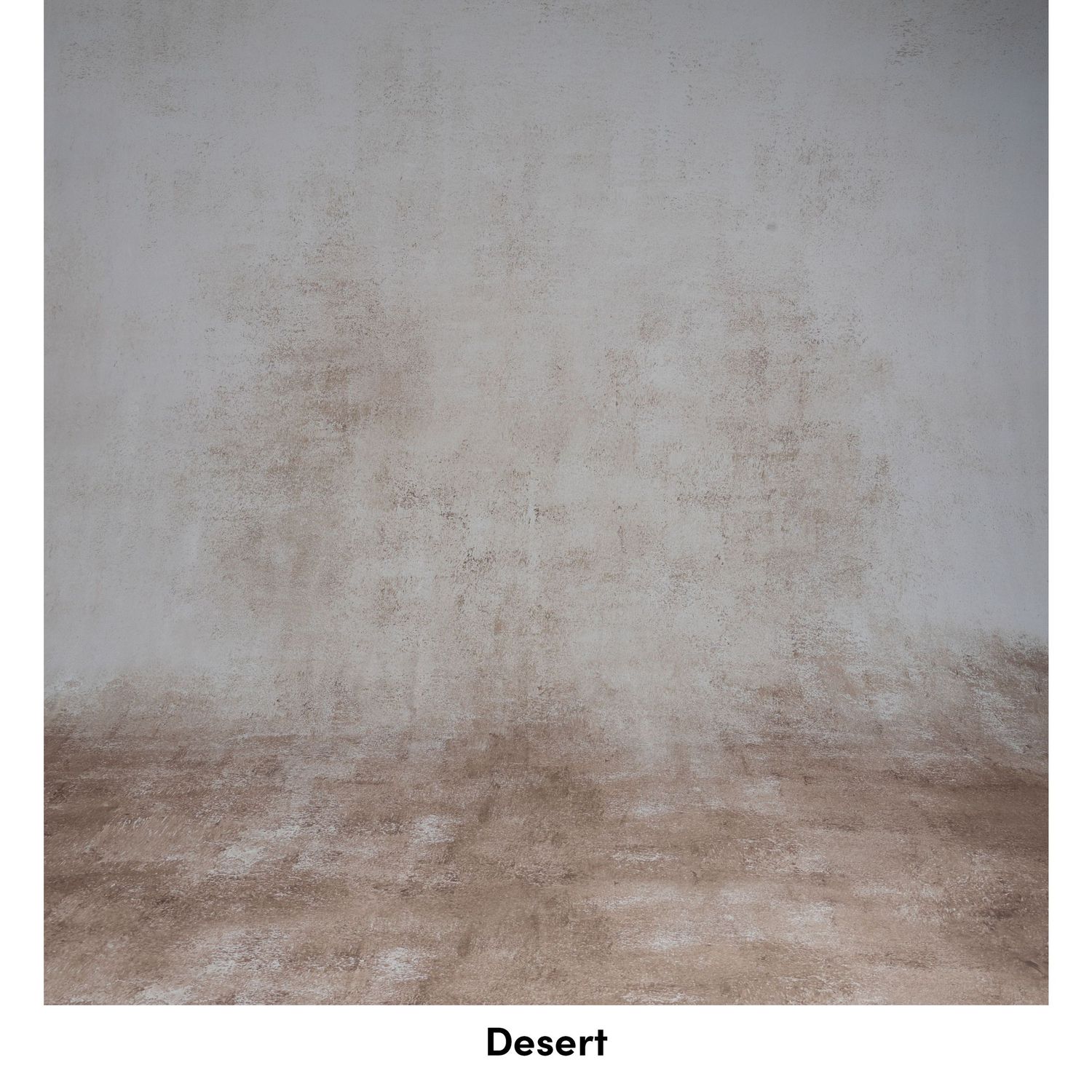 Soft desert-toned photography backdrop with subtle light gradient and worn texture.