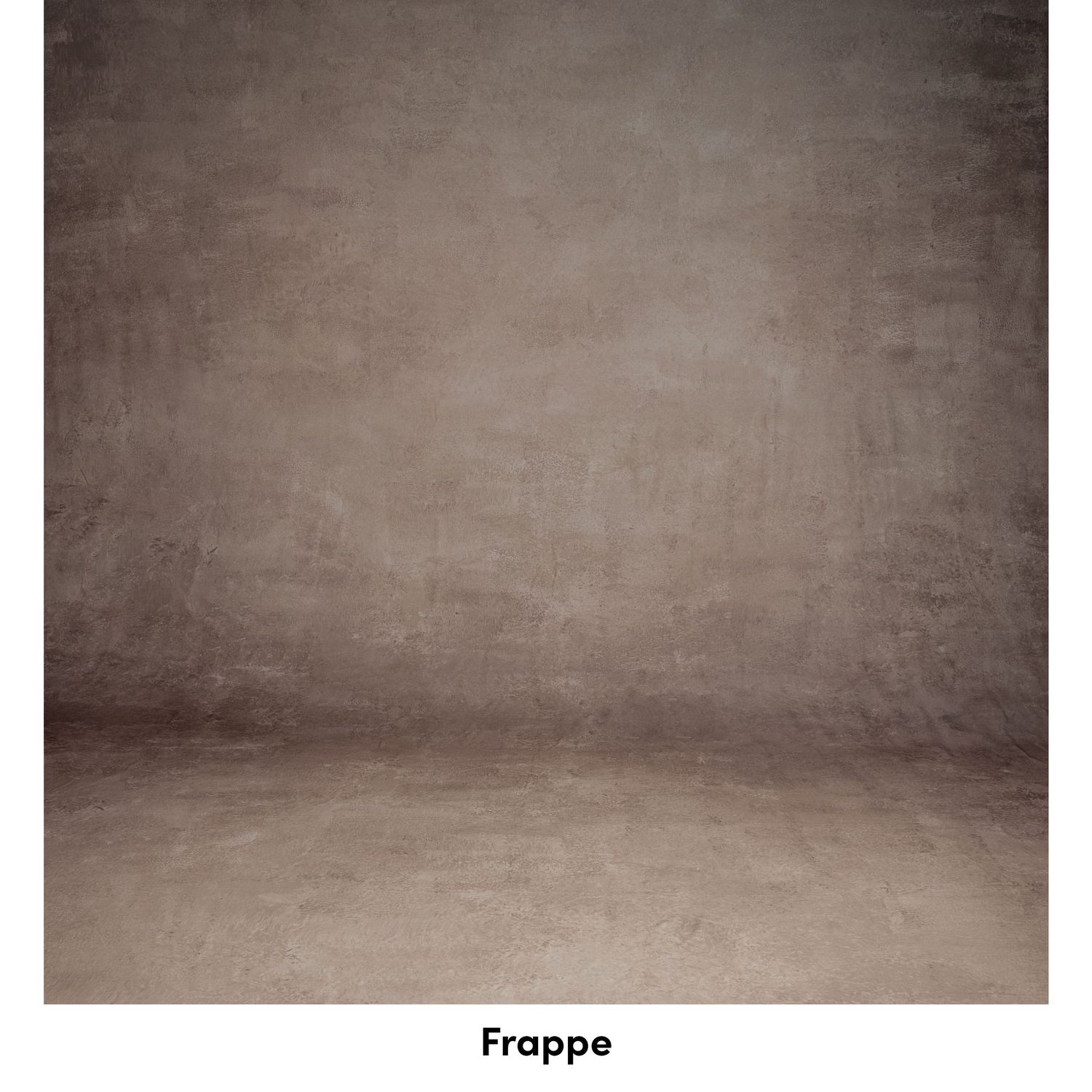 Coffee-colored studio backdrop with darker edges creating a dramatic frappé effect.