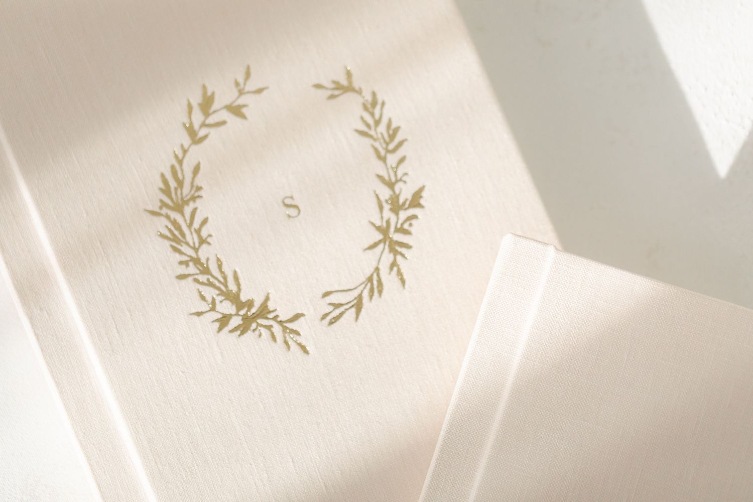 linen photo album with the letter s
