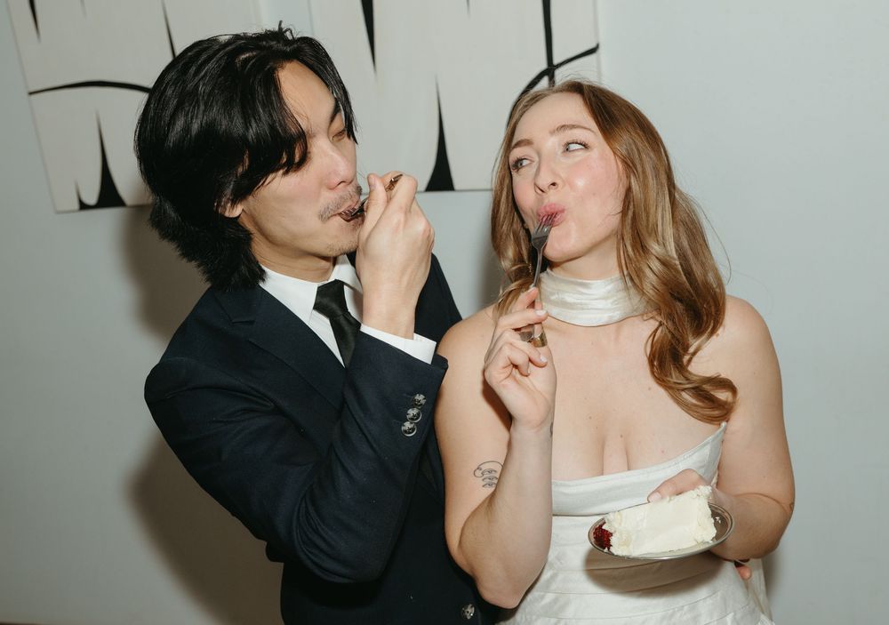 A couple in wedding attire playfully feed each other pieces of wedding cake in a sequence of candid photos.