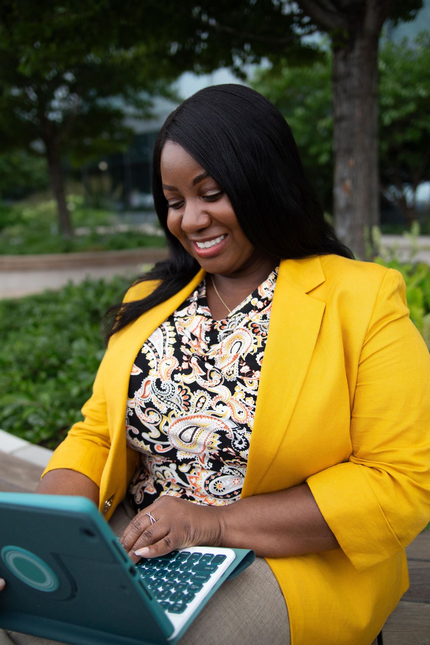 Personal branding photo of an entrepreneur working on an iPad