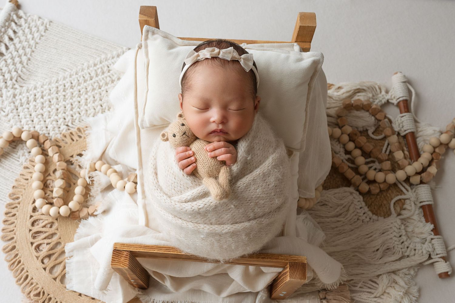 A collage of neutral-toned newborn photography images featuring soft fabrics and natural textures.