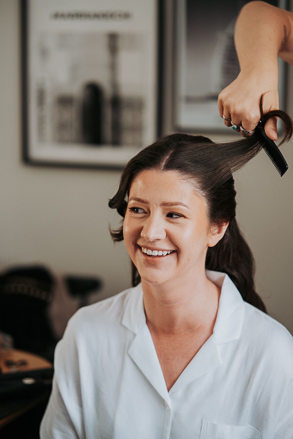 A series of getting ready photos showing someone in a white robe during wedding preparations.