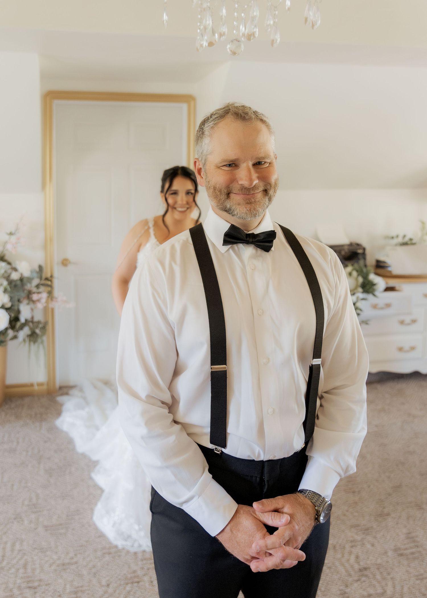 father smiles anxiously before first look with his daughter, bride portraits at Whispering Willow Scoudouc wedding photography New Brunswick