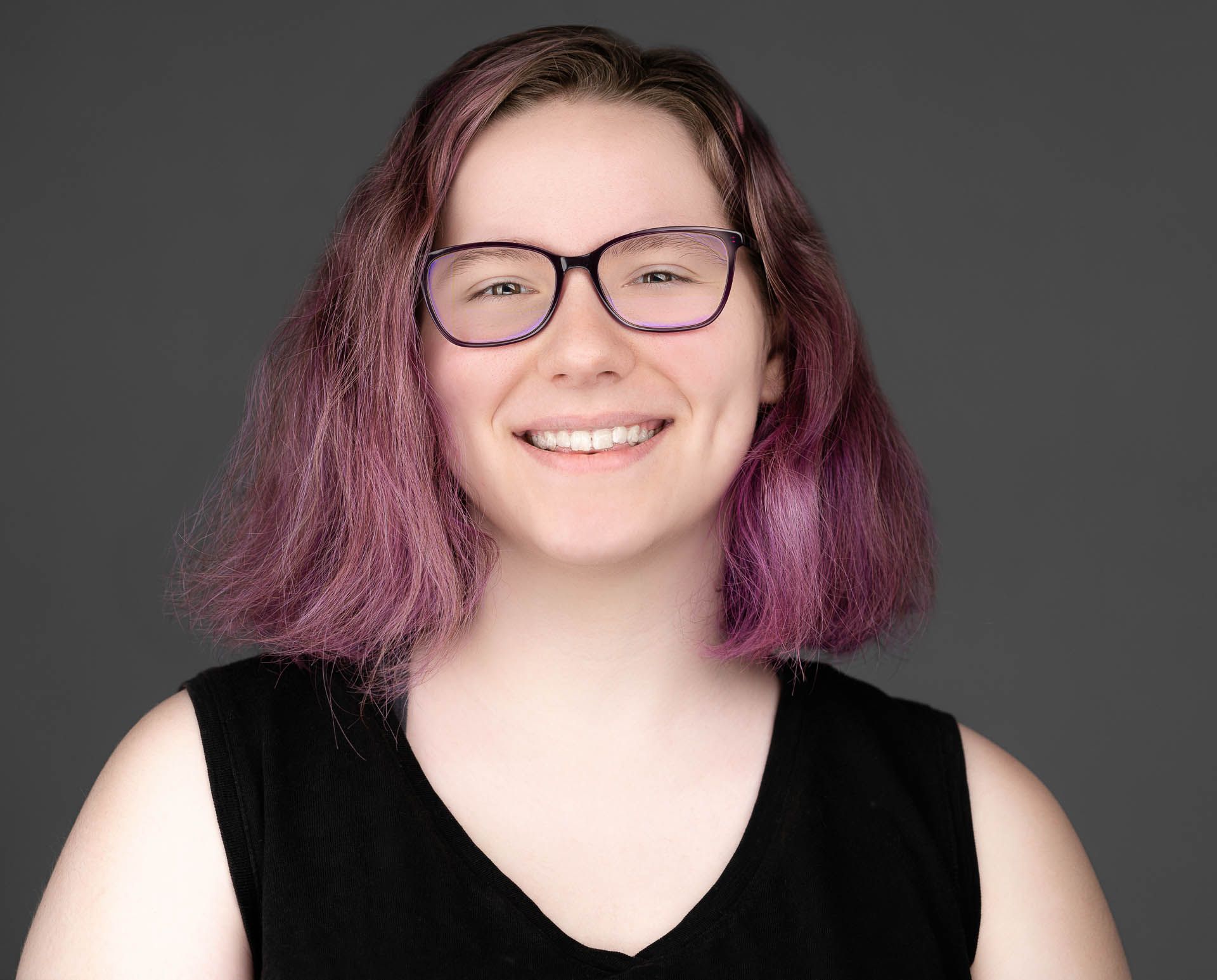 Commercial actor headshot with natural smile in Charleston studio