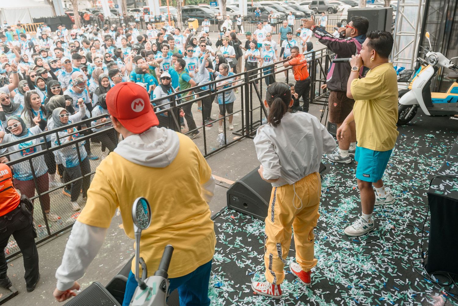 Excited baseball fans celebrate at a stadium with confetti falling during a championship game celebration.