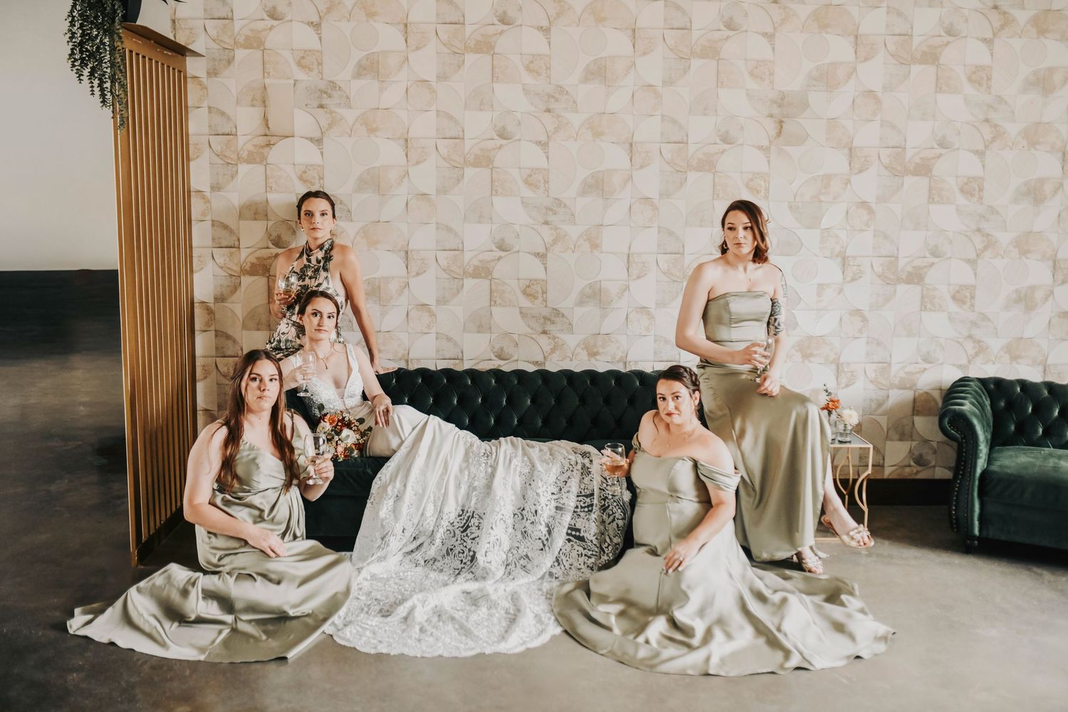 Editorial bridal party portrait with bride and bridesmaids posing in a Vogue-inspired style during Dallas wedding day.