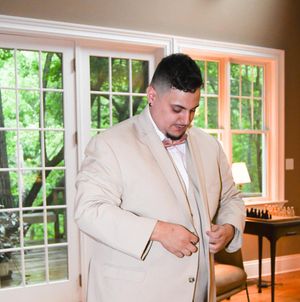 A sequence of photos showing groomsmen getting ready and adjusting their tan suits before a wedding ceremony.