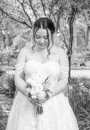 A series of bridal portraits showing a white lace wedding dress in an outdoor garden setting.