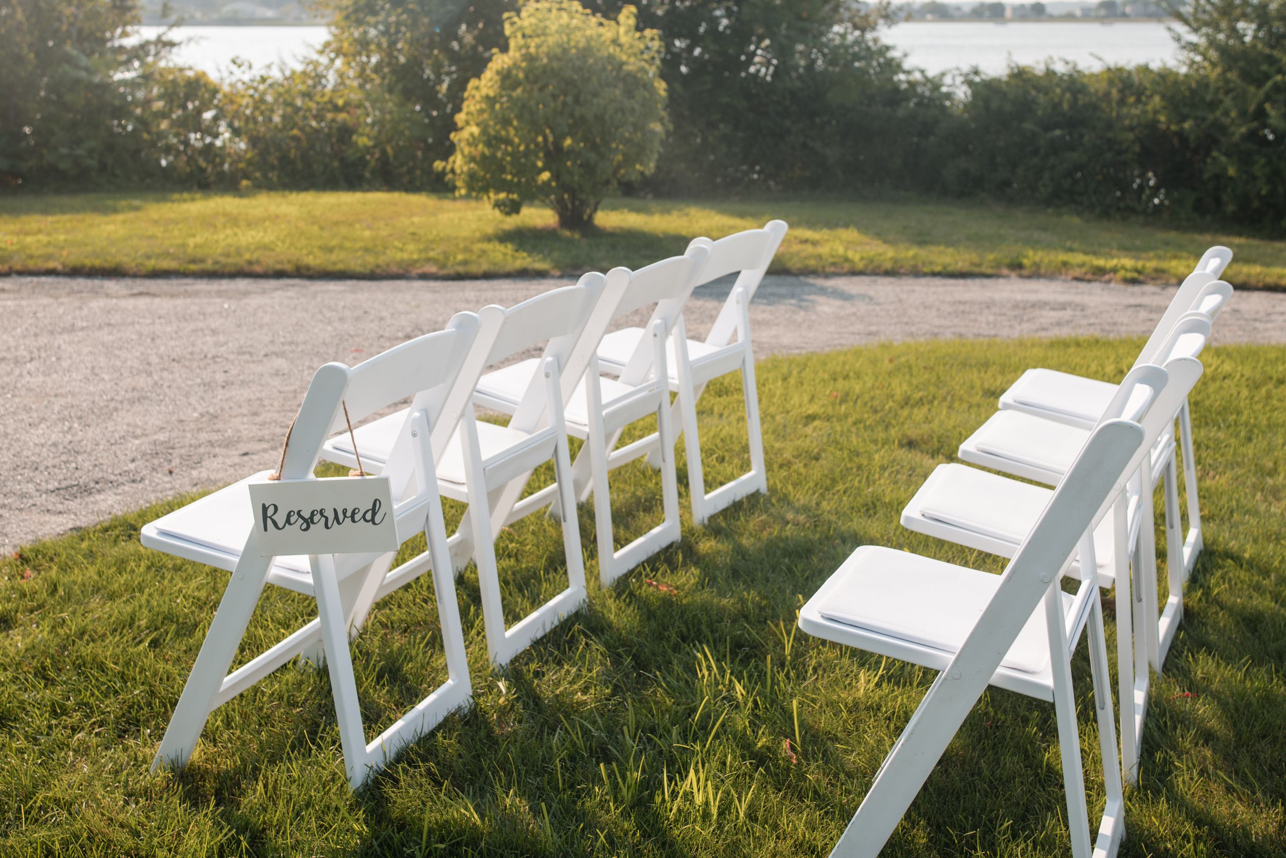 Sunset wedding portraits at the Boat House Tiverton. Candid, authentic moments at this premier Mount Hope Bay wedding venue in RI.