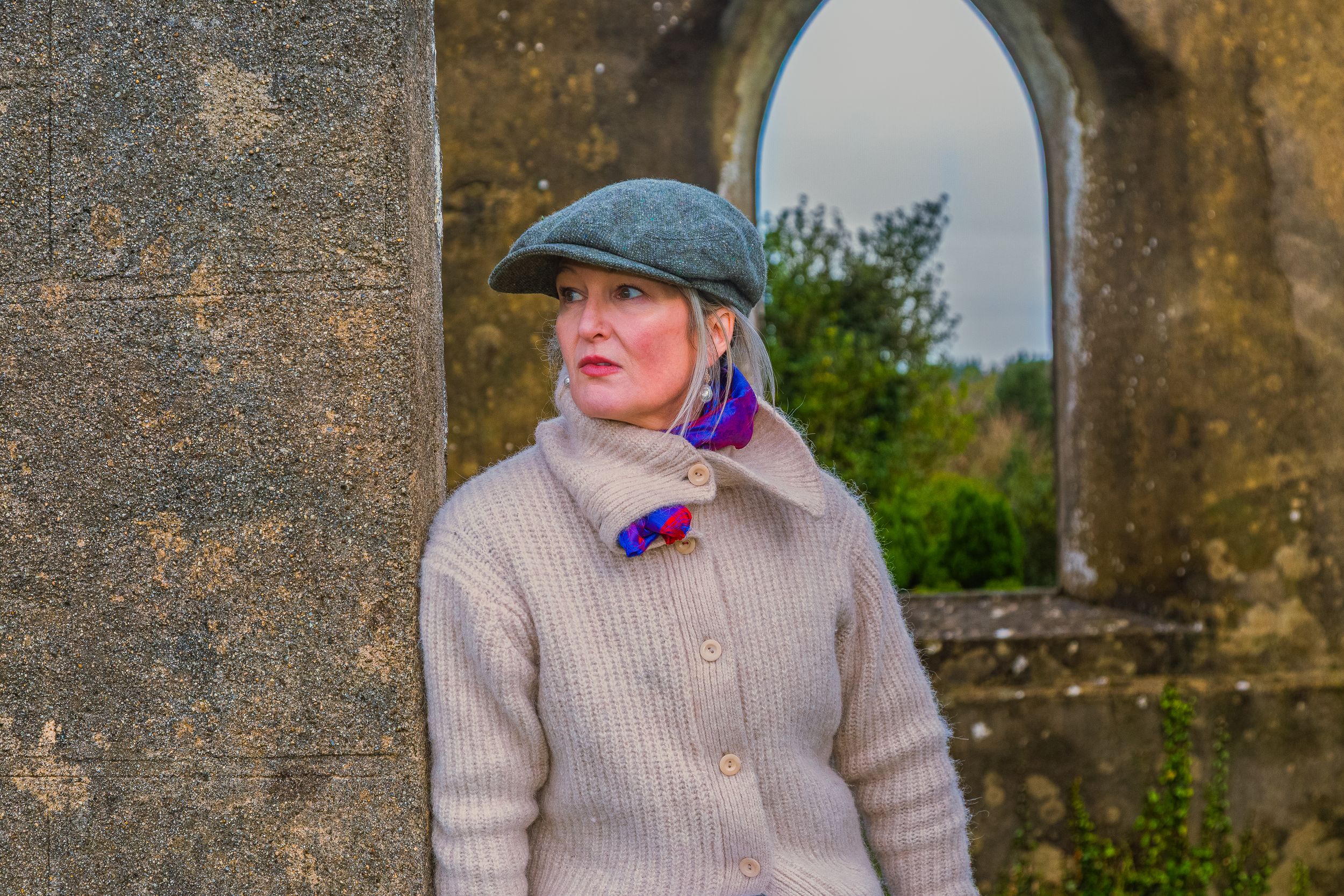 Wicklow old church vacation photography session with lady enjoying a stop during the Wicklow private day tour.