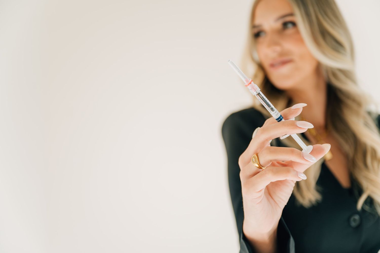 A collage of three photos showing someone holding and smoking a cigarette against a light background.