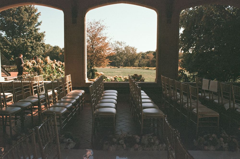 A panoramic sequence of sunset views from a wooden deck overlooking trees and distant mountains in warm evening light.