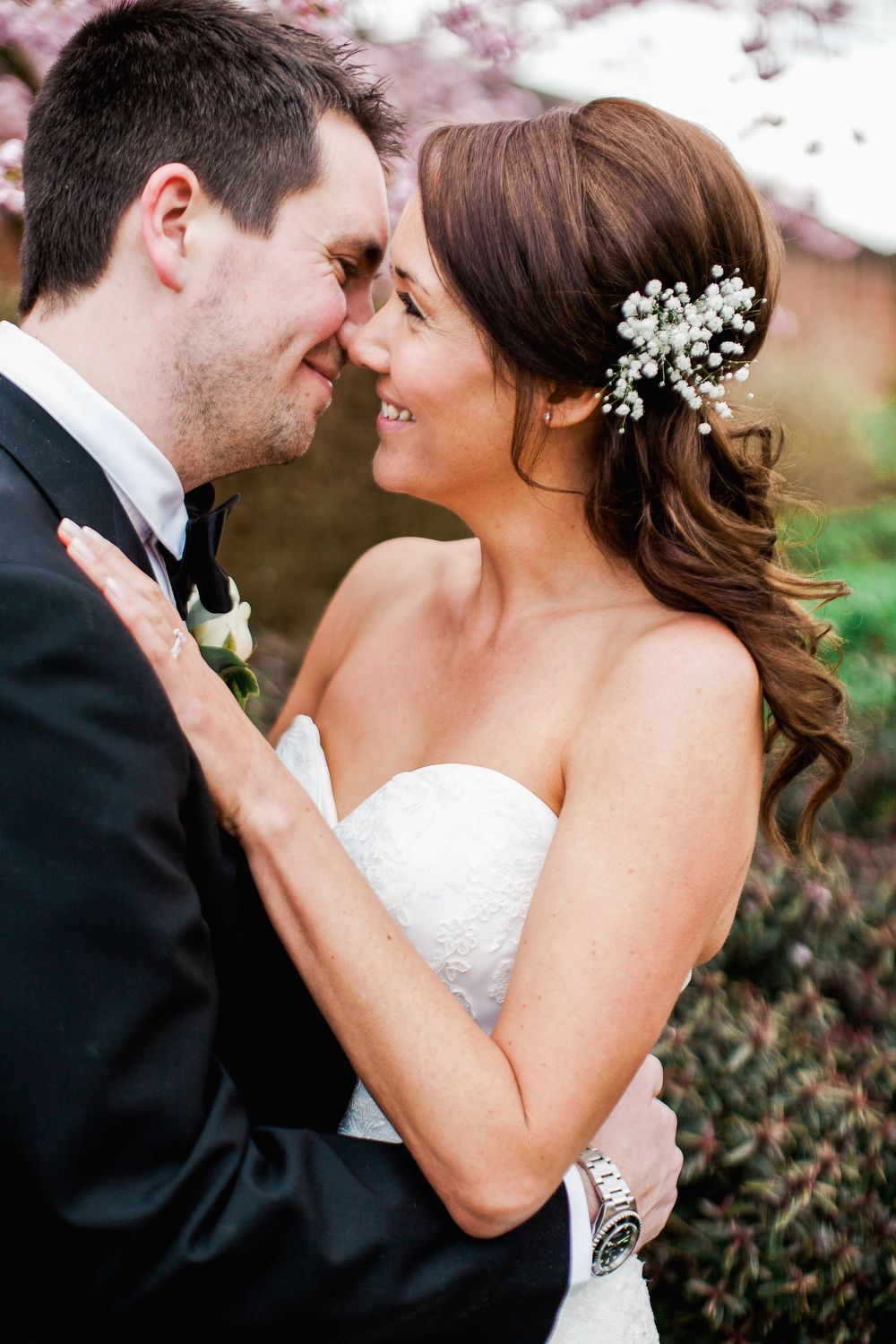 Romantic close-up moments between newlyweds against a soft blurred background.