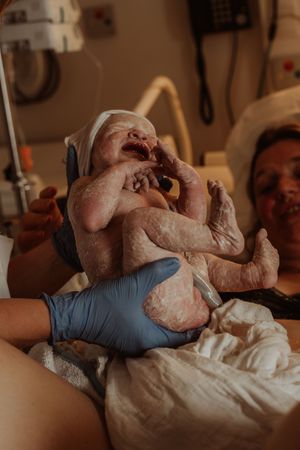 Geboortefotograaf geboorte geboortefotografie brabant Oss bevalling Den Bosch Uden  fotografie baby newborn newlife zwangerschapsshoot gezin