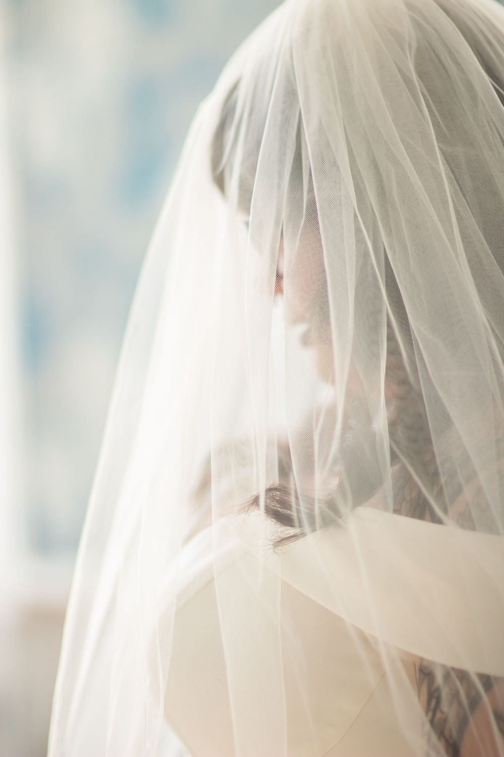 Bride getting ready in Carthage, Missouri by Missouri wedding photographer