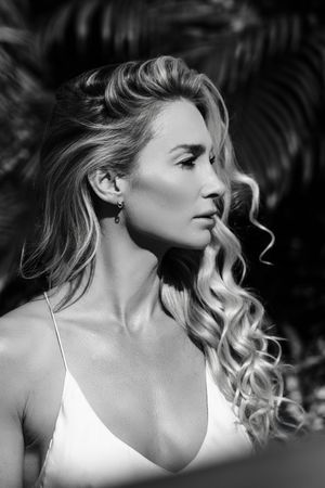Black and white editorial beauty portrait featuring soft glam styling in Jupiter Florida luxury photography session.