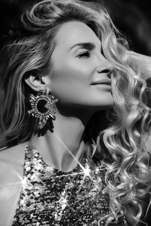 Black and white luxury beauty portrait with sequined styling photographed in Jupiter Florida editorial session.