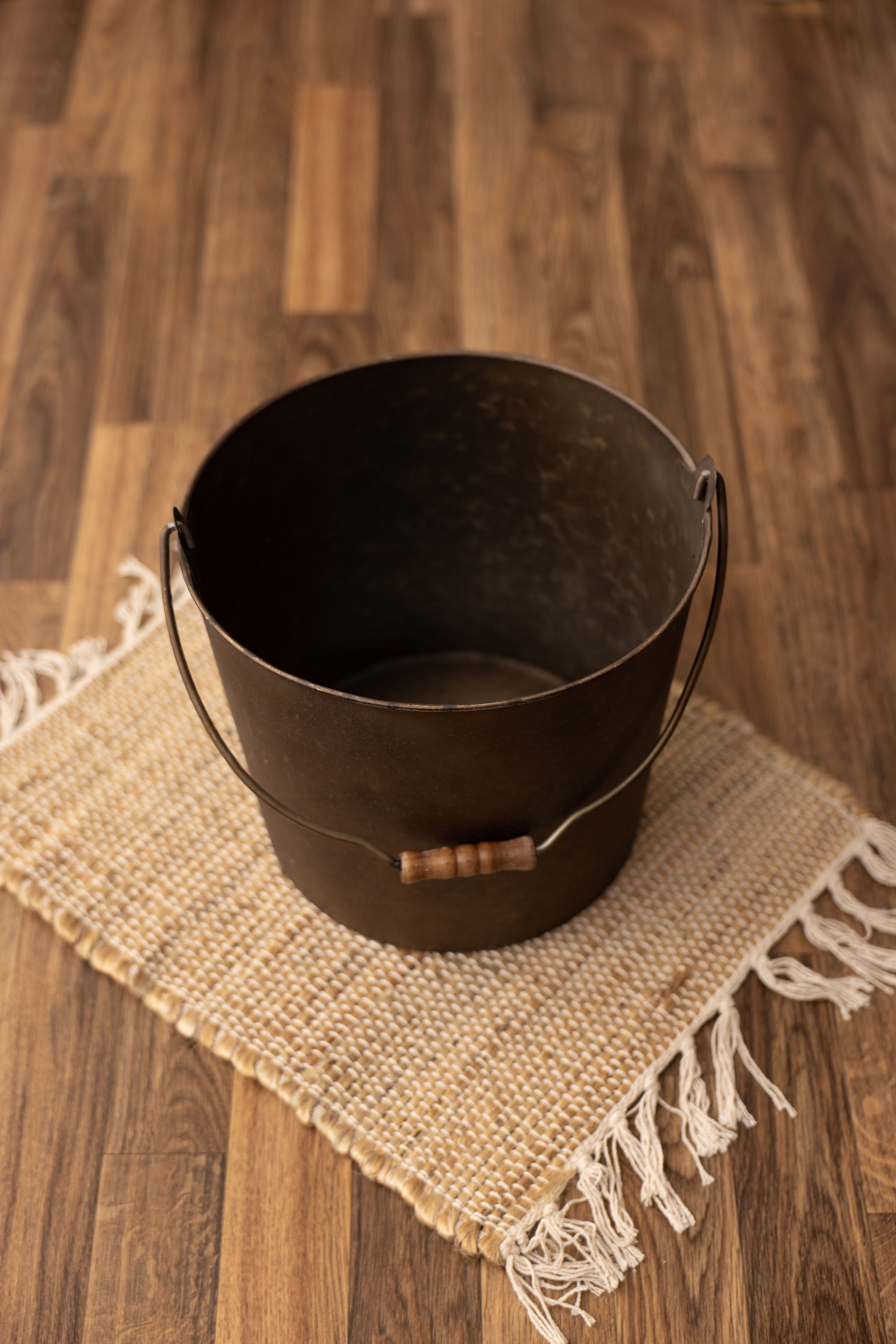 Brown galvanized bucket with handle