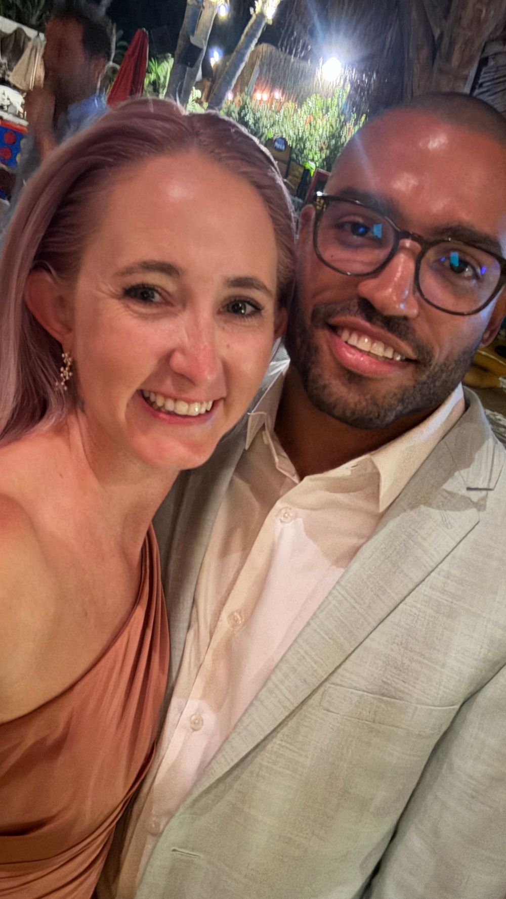 A series of four selfie photos showing a couple smiling together in what appears to be a restaurant or social setting.