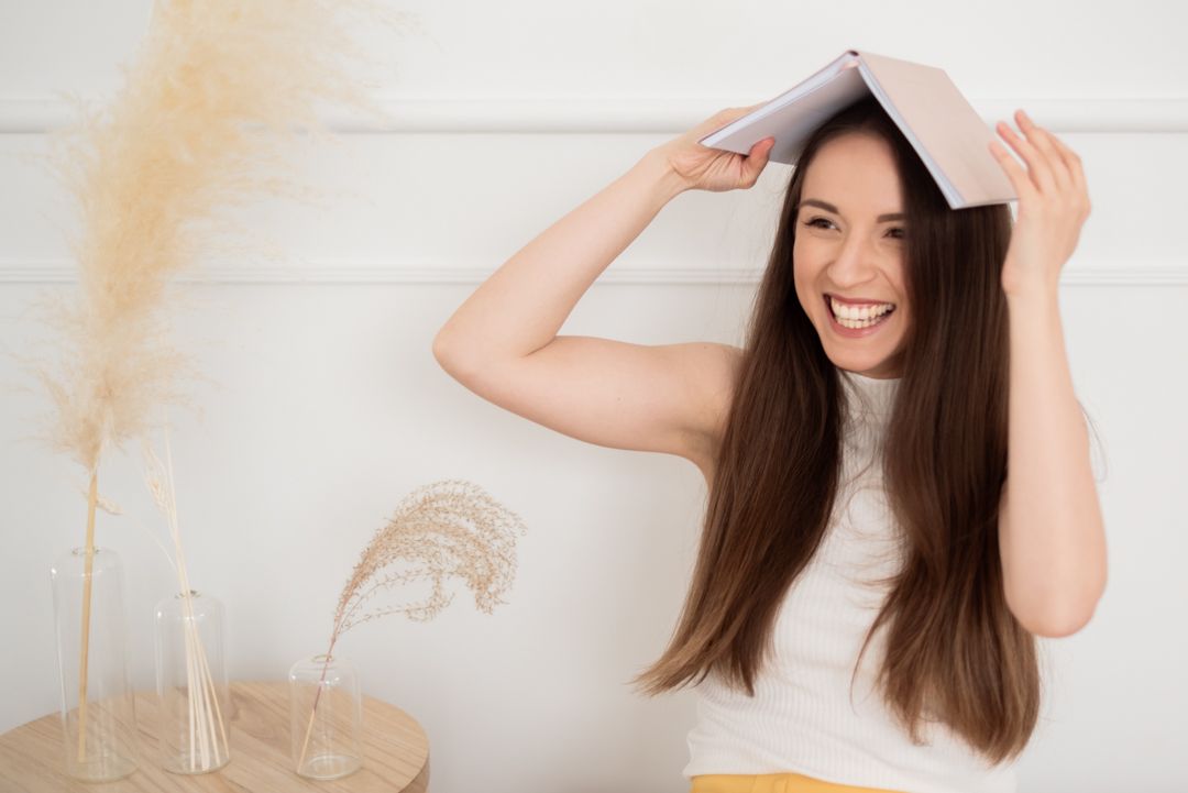 Portrait series against white background showing playful hair movements and expressions.