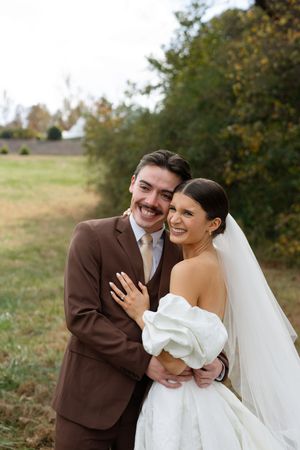 A couple shares intimate moments during their fall wedding photo session.