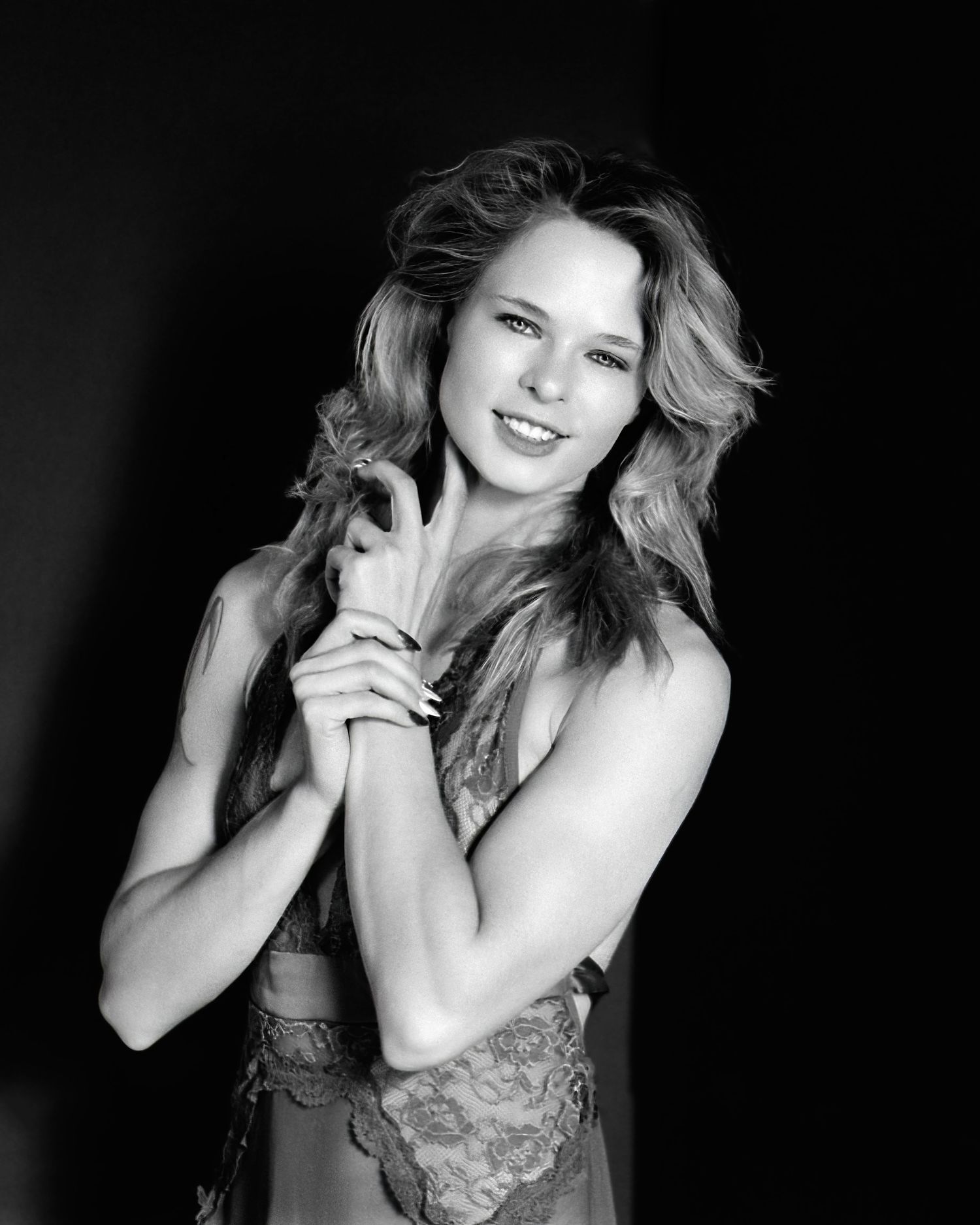 David G Holt Photography - Artistic black and white boudoir portrait series with dynamic poses and lighting.