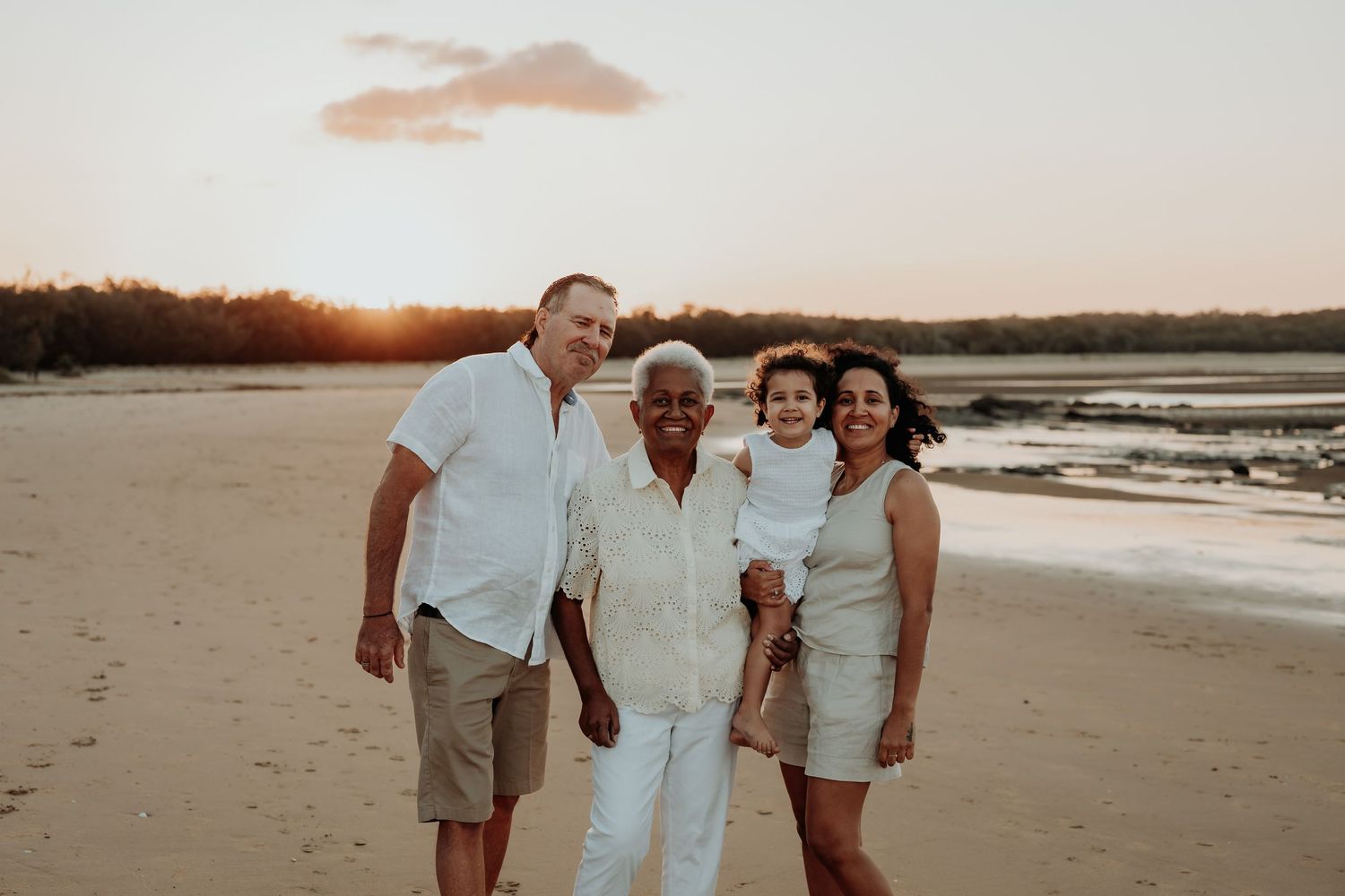 Group enjoying a sunset moment together at tannum sands beach.