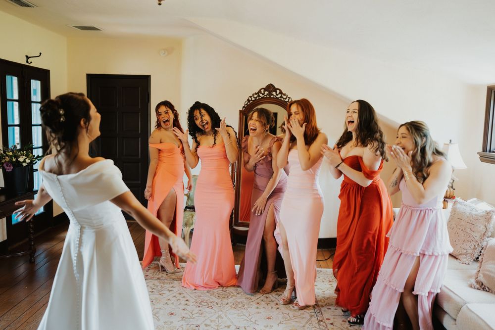 A sequence of wedding party photos showing bridesmaids in pink and coral dresses getting ready for the celebration.