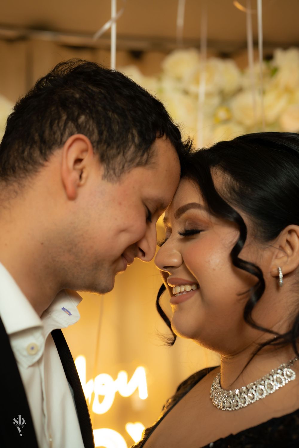 A romantic sequence of close-up shots showing a couple sharing tender moments in warm lighting.