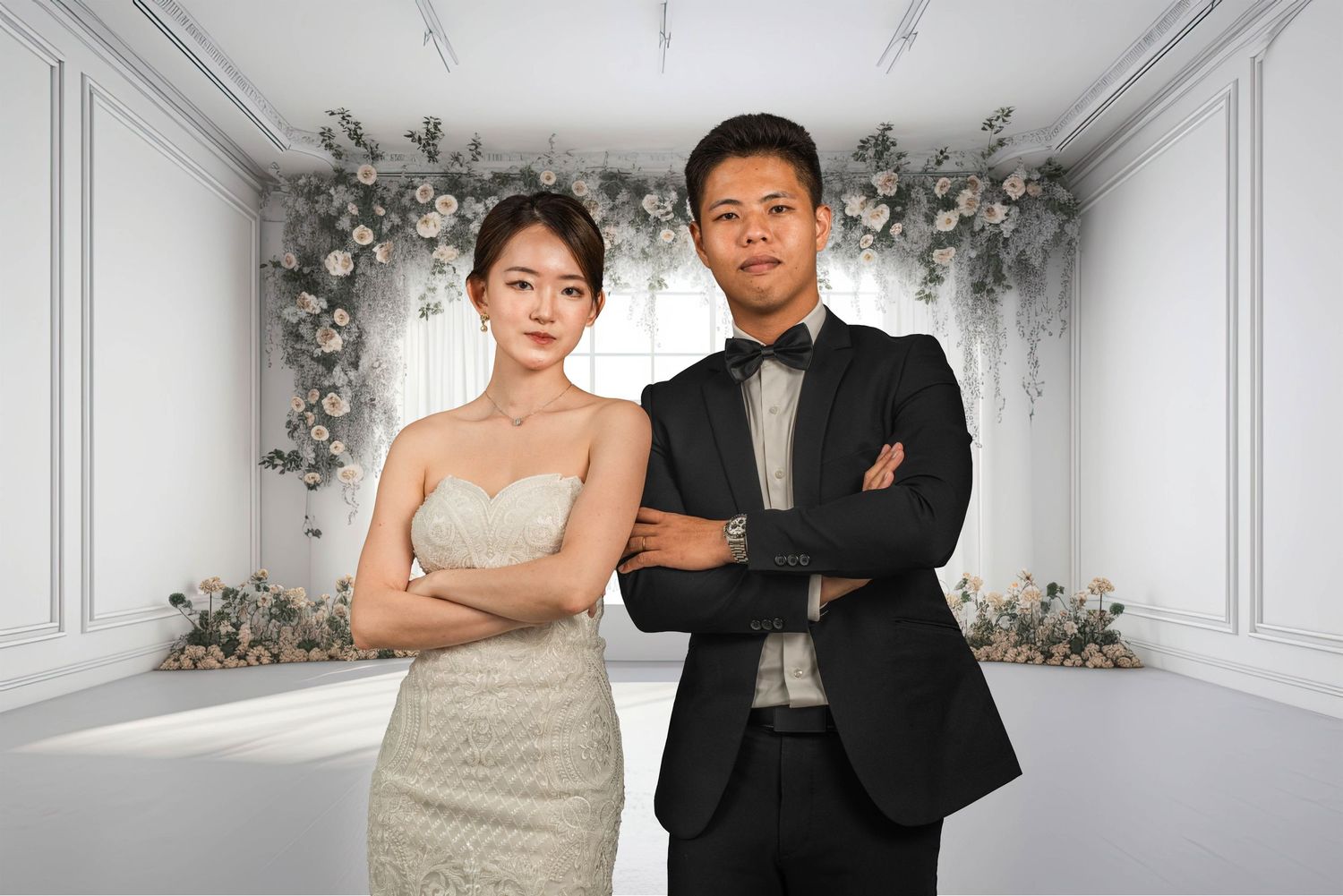 Formal portrait in elegant white room with floral arch decorations.