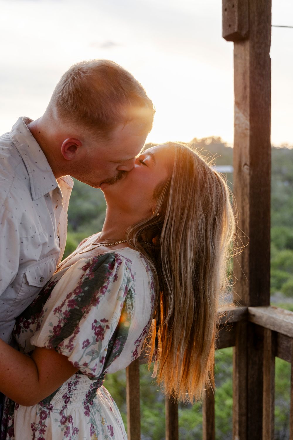 Sunset-lit Texas Hill Country setting for romantic surprise engagement in Dripping Springs.