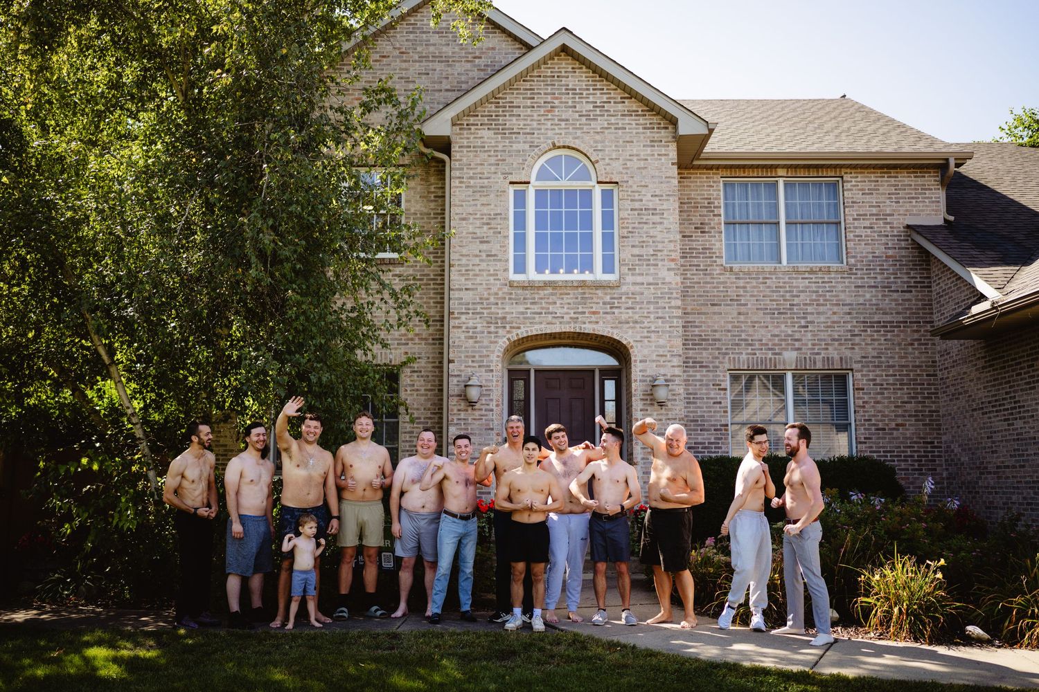 Progressive sequence of people standing in front of a beige brick house during a fun group photo session.