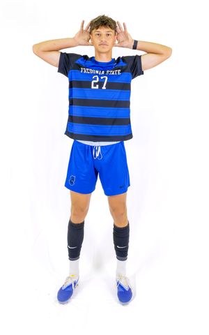Athlete in striped Fredonia State uniform shows various soccer poses.