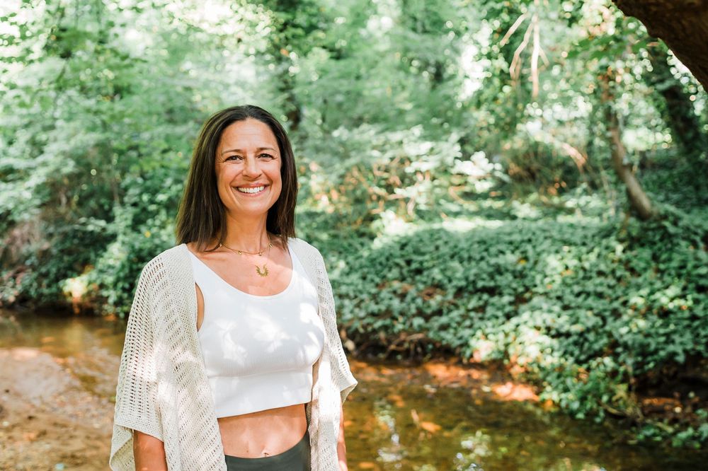 Five outdoor portrait photos showing someone posing in white clothing against lush green foliage and nature backgrounds.