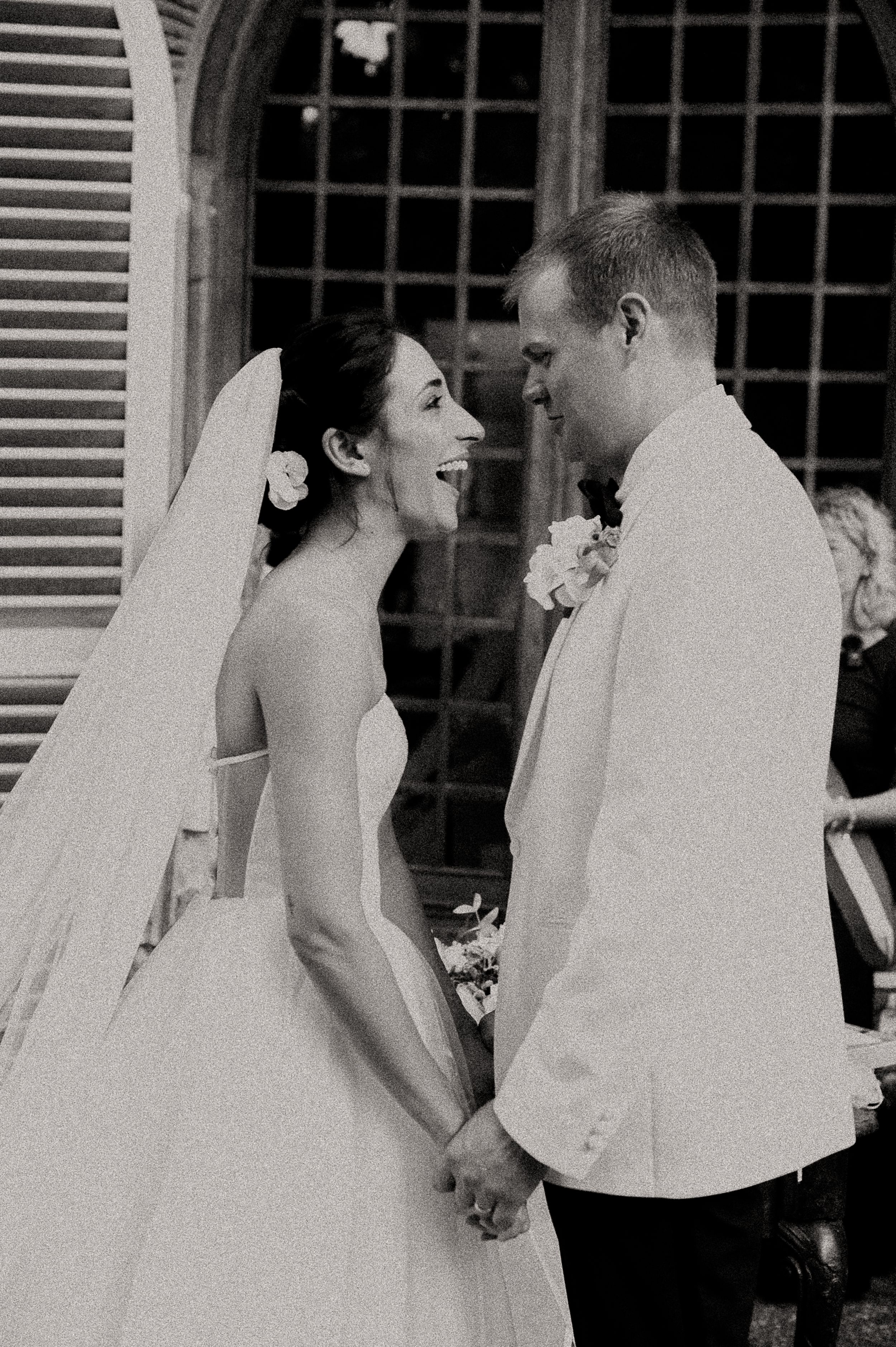 A candid black and white sequence of a romantic dance moment at a wedding celebration.
