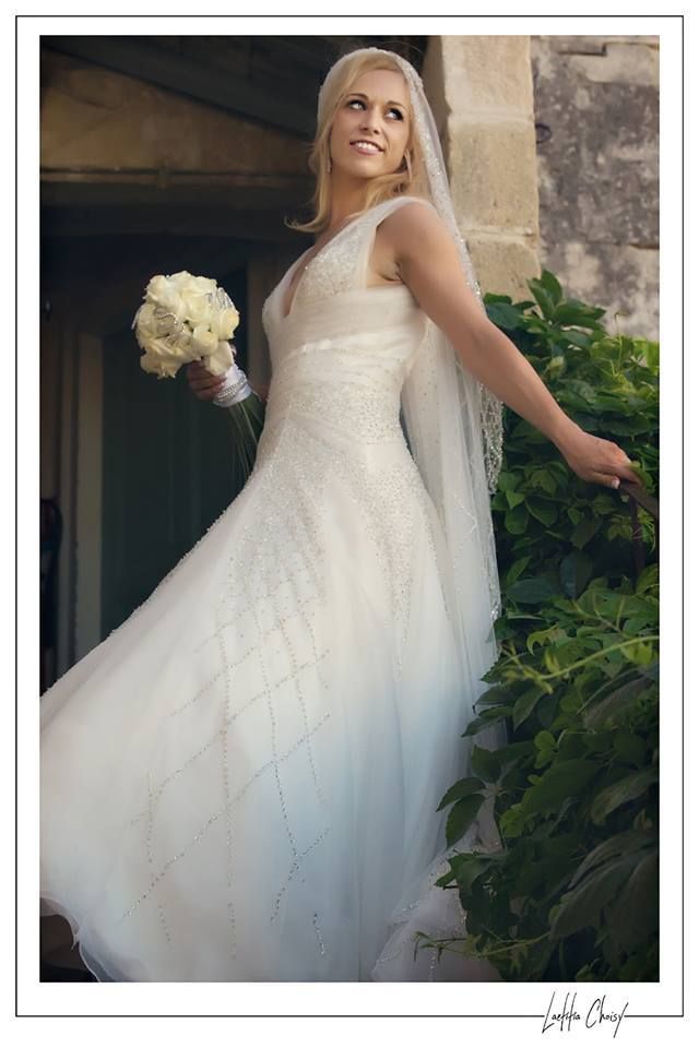 Bride holding her bouquet in the gardens of Château de Pouget, South of France destination wedding photographer inspiration