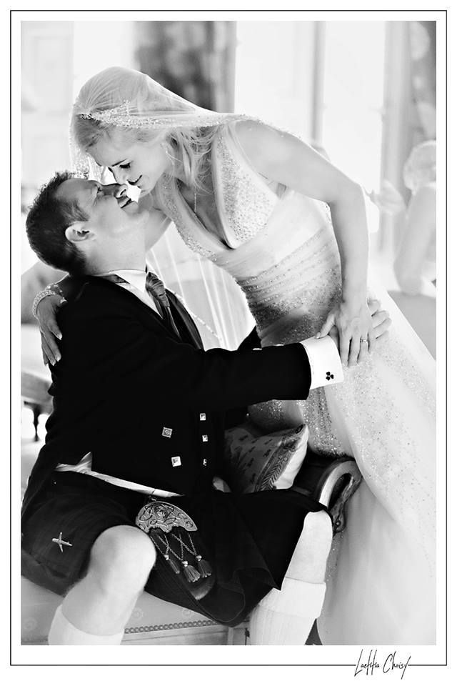 Romantic black and white photo of bride and groom sharing moment at Château de Pouget, South of France destination wedding photographer
