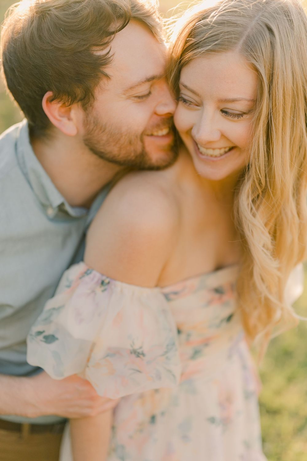 An intimate portrait session in warm evening light with soft floral details.