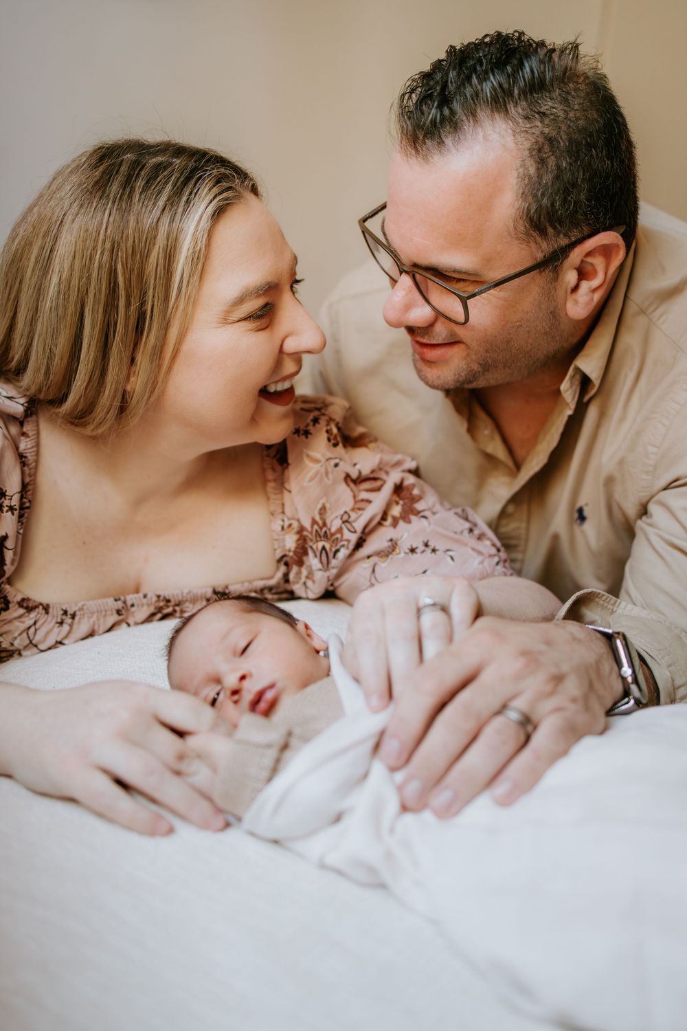 In-home newborn session capturing family love and connection in Adelaide