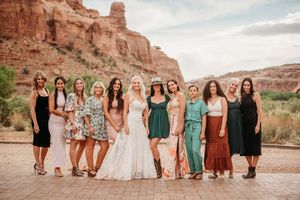A collection of bridesmaids and bride photos taken at scenic red rock formations during a desert wedding celebration.