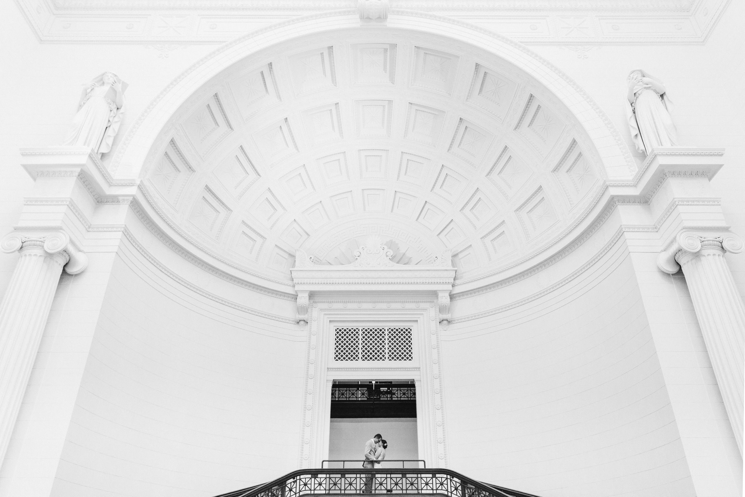 Elegant white domed architectural detail of a historic building with ornate molding.