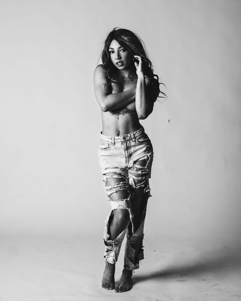 Black and white luxury editorial boudoir photograph by Mimi Frank Photography in Edmonton, Alberta, Canada