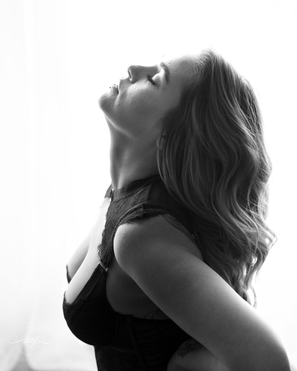 Black and white luxury editorial boudoir photograph by Mimi Frank Photography in Edmonton, Alberta, Canada