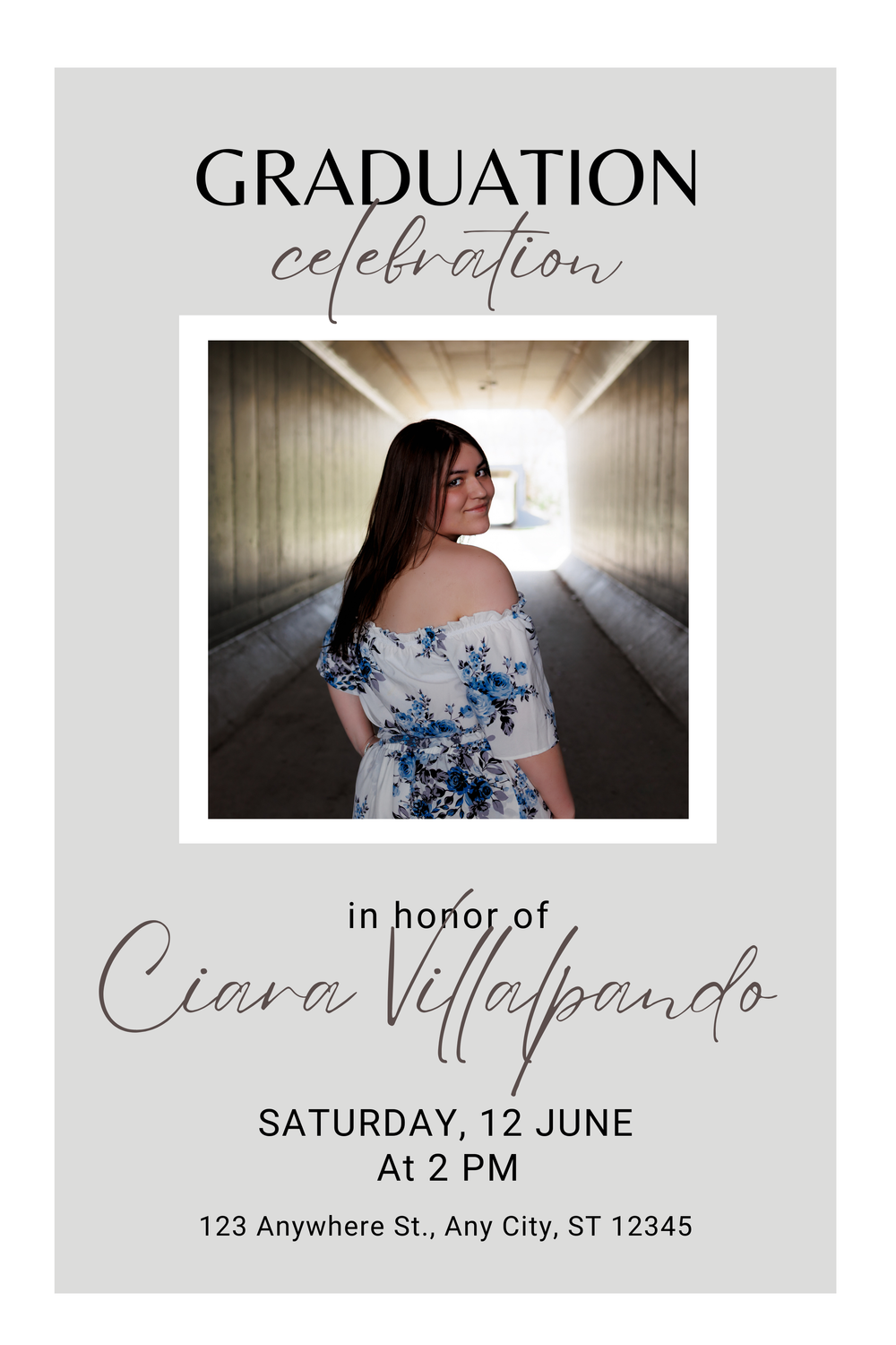 A graduation celebration invitation featuring an artistic photo in a tunnel with floral dress against a gray background.