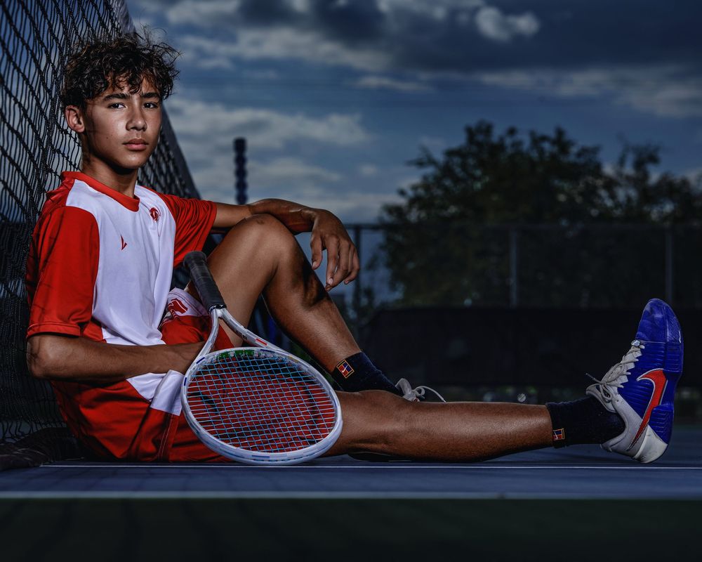 A panoramic sequence of tennis shots showing serve and follow through motions against a dramatic evening sky.