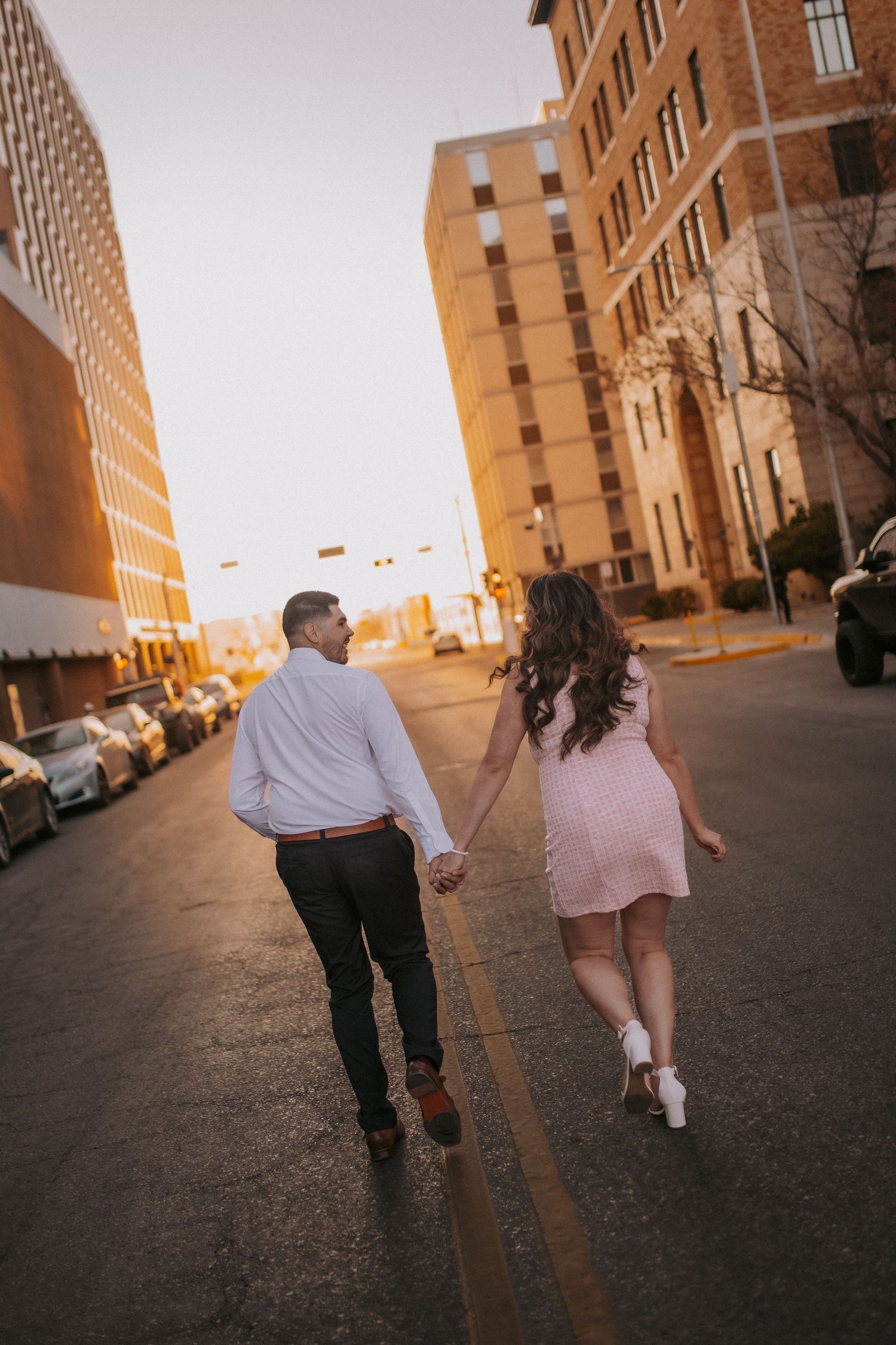 Albuquerque engagement photographer, engagement photos in albuquerque, rooftop engagement session, romantic and fun engagement session