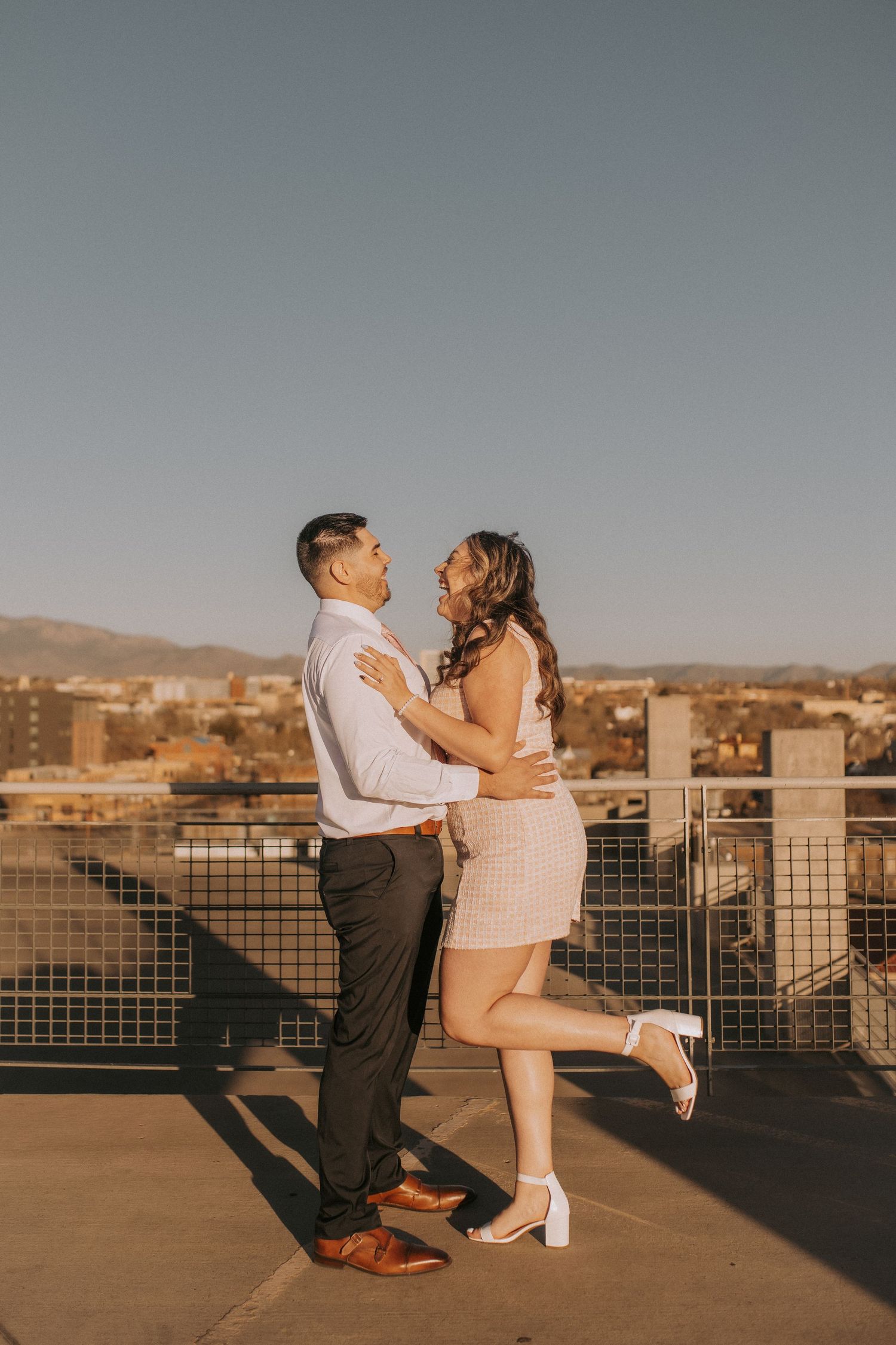 Albuquerque engagement photographer, engagement photos in albuquerque, rooftop engagement session, romantic and fun engagement session